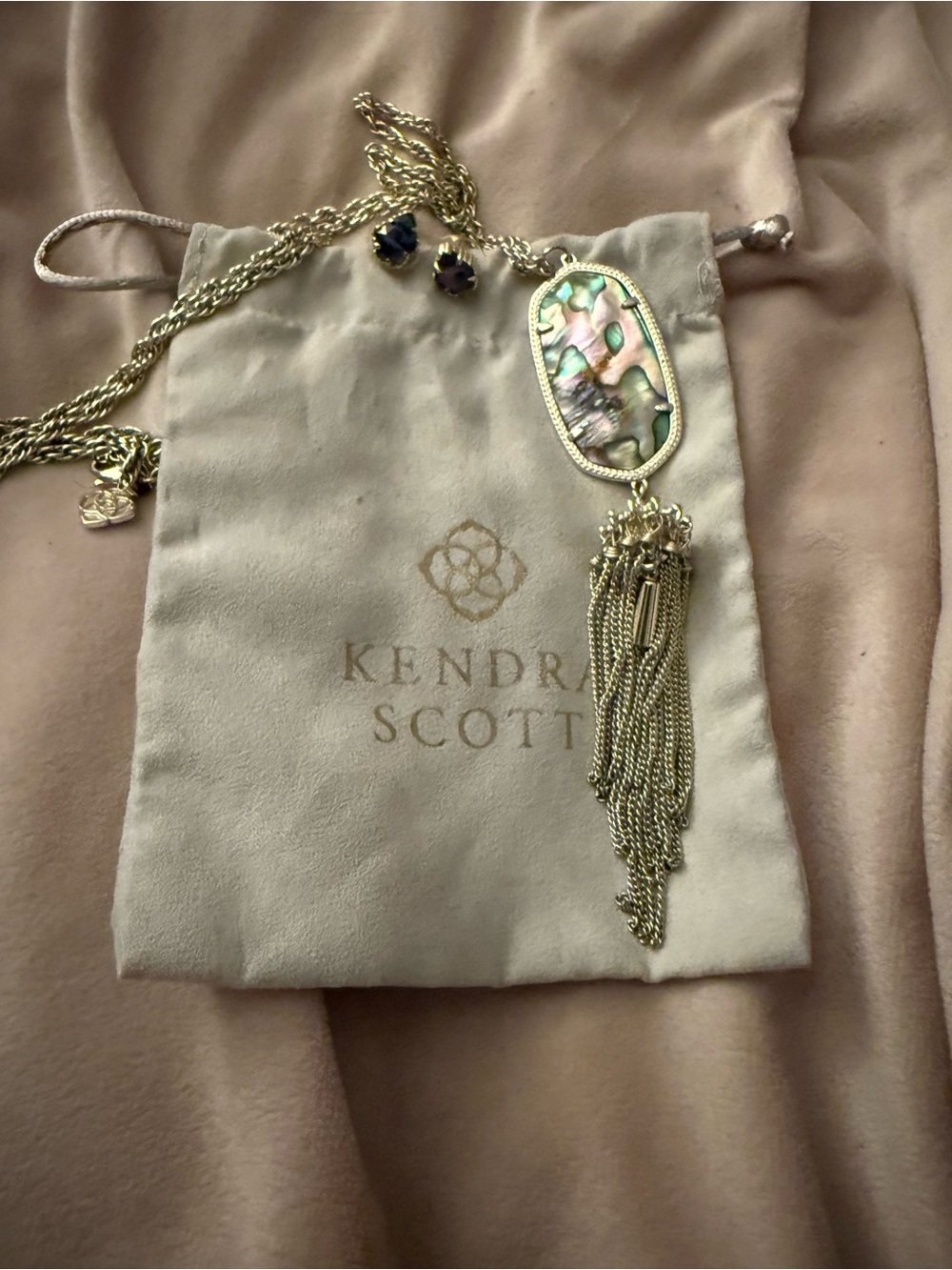 Kendra Scott Abalone Gold Rayne Pendant Tassel Necklace with matching earrings